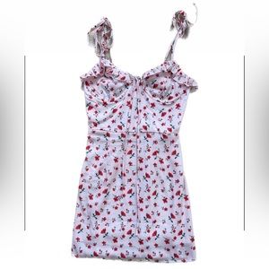 LIGHT PINK FLORAL DRESS WITH ADJUSTABLE STRAPS. THE ALLEN MINI DRESS. SIZE 0